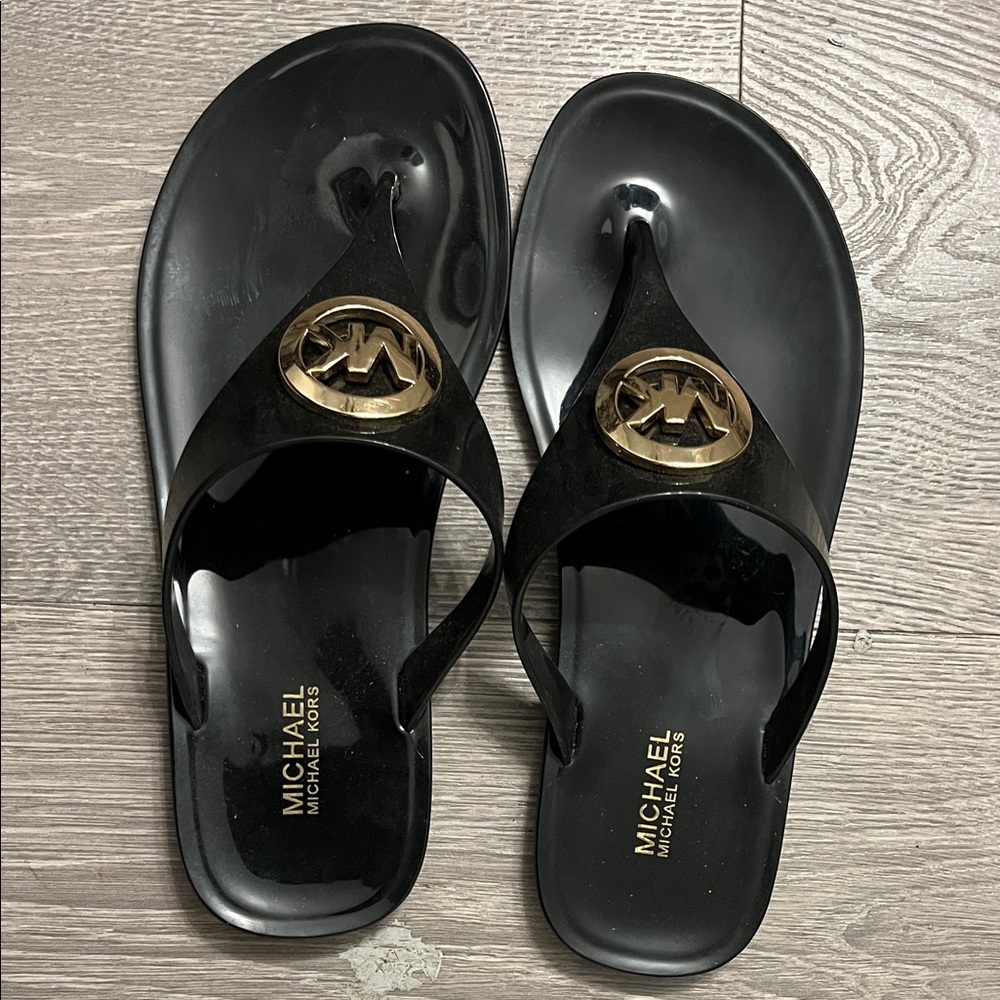 Michael Kors Black Flip Flops with Gold Emblem